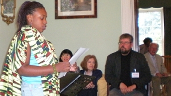  student reading at Hopkins Youth Festival